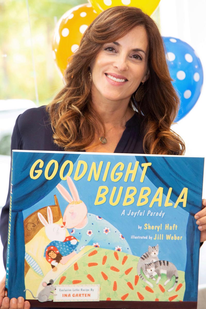 Sheryl-holding-goodnight-bubbala-book